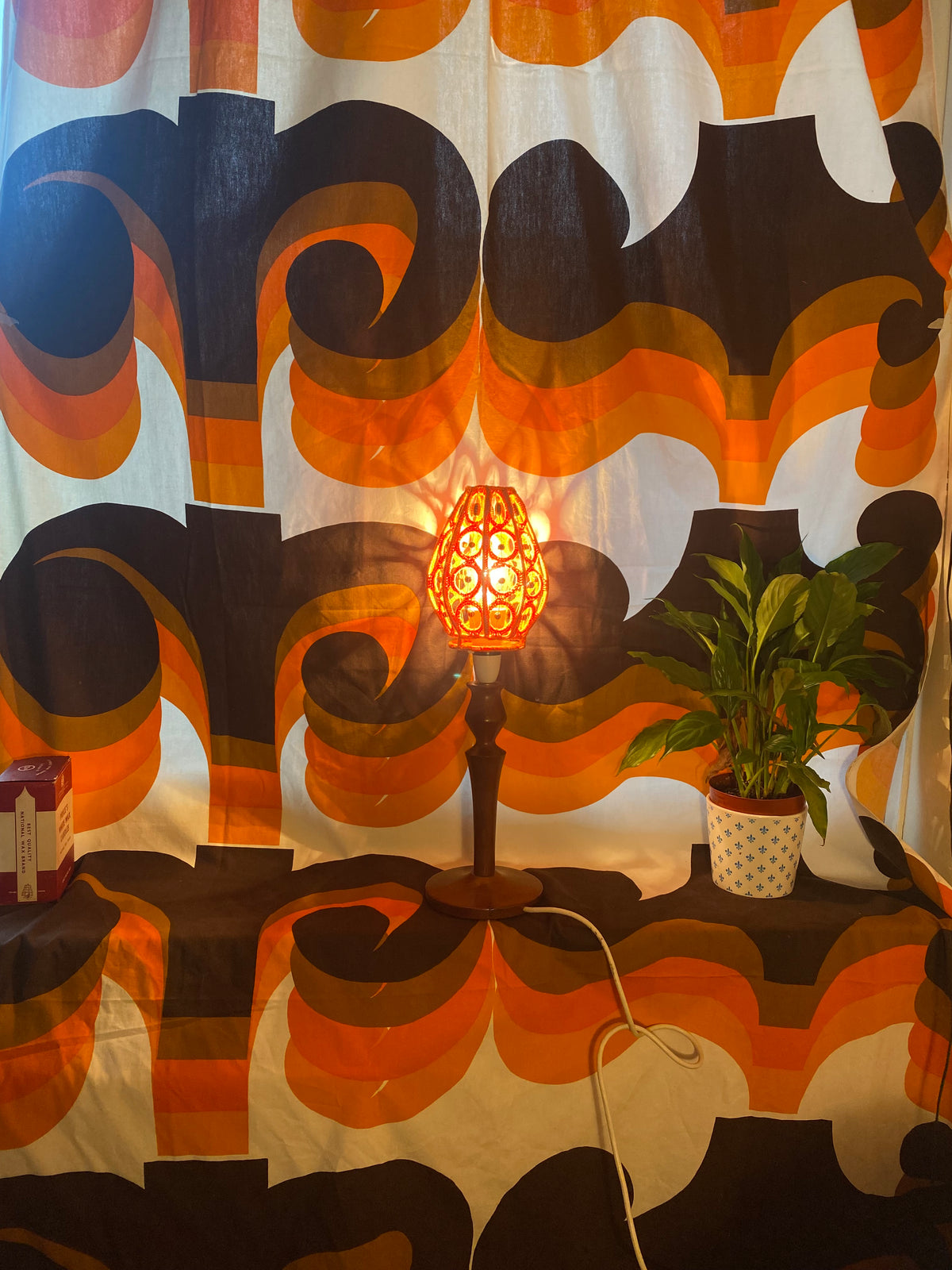 Upcycled orange crochet lamp