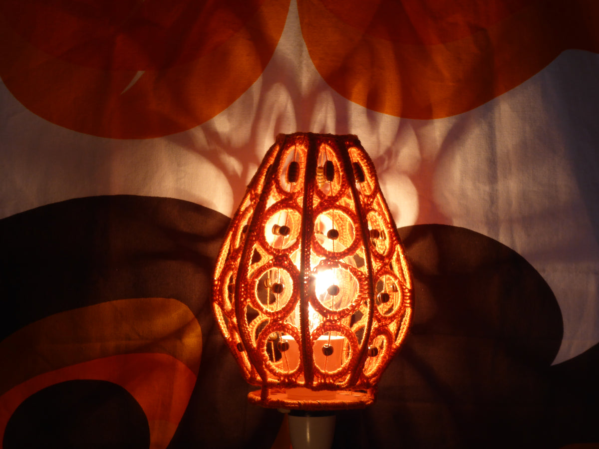 Upcycled orange crochet lamp