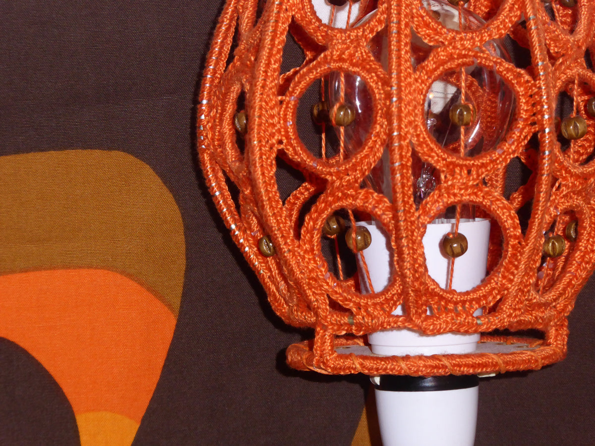 Upcycled orange crochet lamp