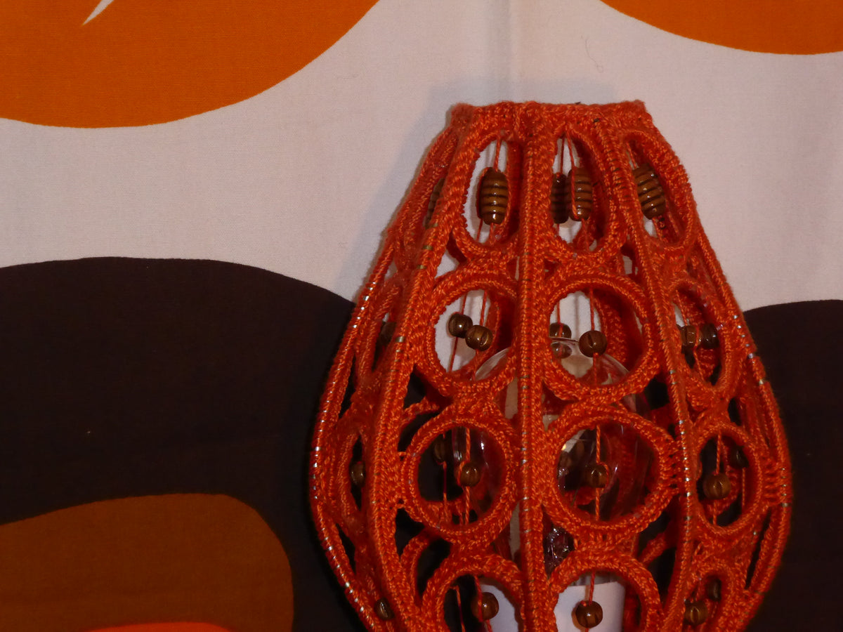 Upcycled orange crochet lamp